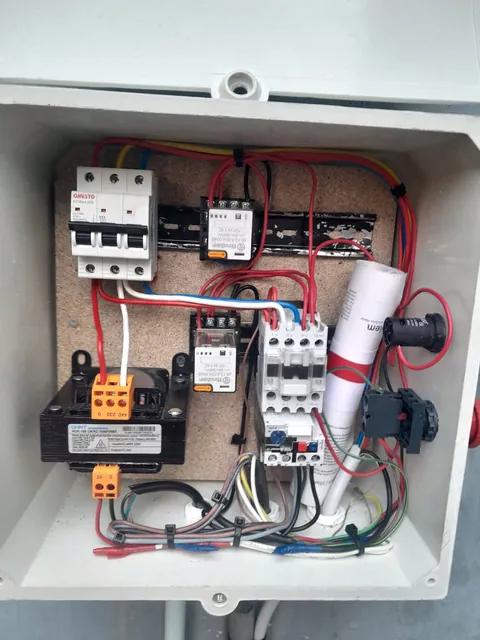 Control box with a breaker, control transformer, relays, contactor and overload relay